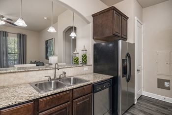 Side-by-side refrigerators with dispensers (water and ice)